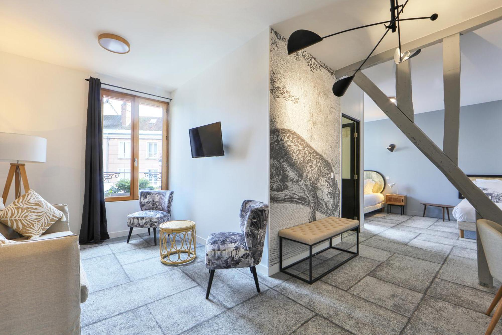 Logis Hotel & Restaurant Du Sauvage La Ferte-Gaucher Room photo